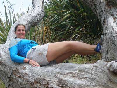 Betty relaxes in a tree at Te Toroa Bay