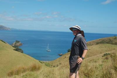 Bradley on Stephenson Island with Shear Madness anchored in the background