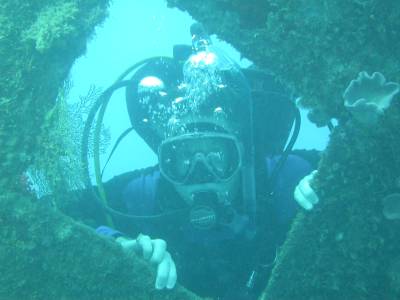Bradley explores the ship at Million Dollar Point